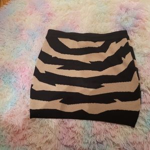 Tiger print skirt Size M stretch material